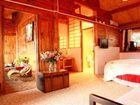 фото отеля Lijiang Riverside Inn