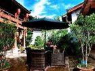 фото отеля Lijiang Riverside Inn