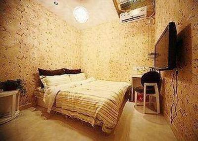 фото отеля Dimensional Space Fashion Hotel Qinghai Road Tsingtao