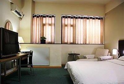 фото отеля Zibo Housing Urban Hotel