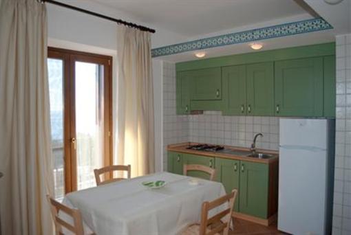 фото отеля Residenza Golfo Degli Ulivi