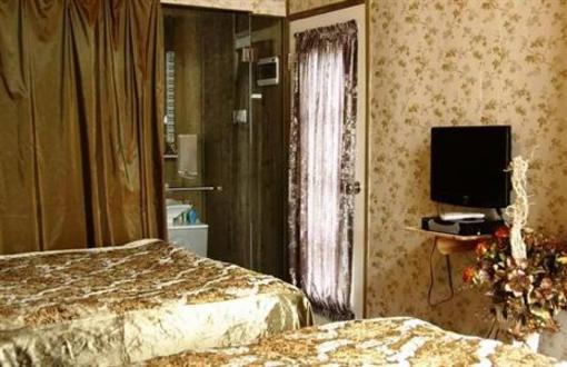 фото отеля Xinyaqi Residence