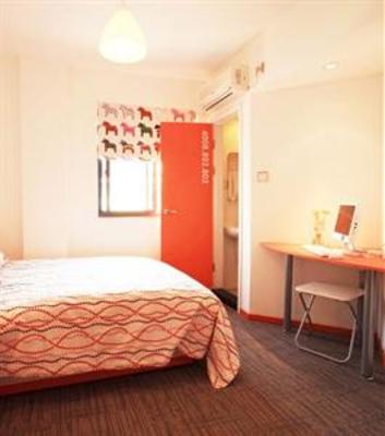 фото отеля Pod Inn Guangbutun