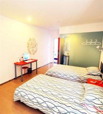 фото отеля Pod Inn Guangbutun