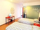 фото отеля Pod Inn Guangbutun
