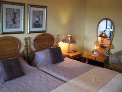 фото отеля Amzee Bokmakierie Guest House Mossel Bay