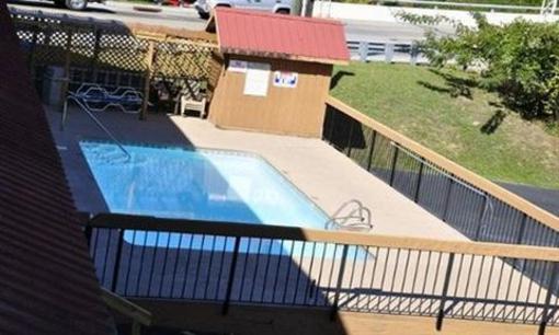 фото отеля Timbers Log Motel