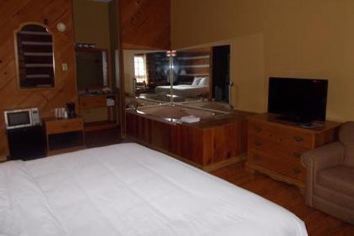 фото отеля Timbers Log Motel