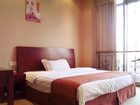 фото отеля Jiujiu Business Hotel Xinghu Street