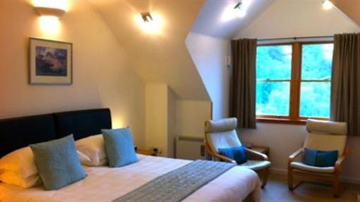 фото отеля Tanglewood Lodge Bed & Breakfast
