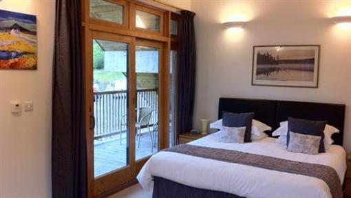фото отеля Tanglewood Lodge Bed & Breakfast