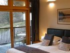 фото отеля Tanglewood Lodge Bed & Breakfast