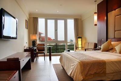 фото отеля Xin Guo Hotel Haikou