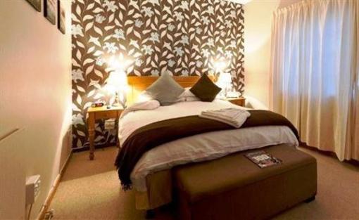 фото отеля Lodge on Main Guest House and Conference Centre