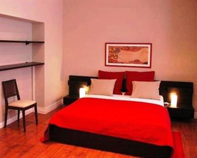 фото отеля Apartamentos Junto a la Giralda