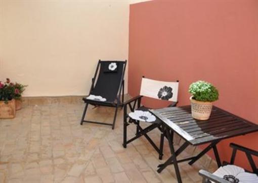 фото отеля Apartamentos Junto a la Giralda