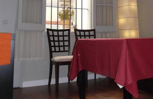 фото отеля Apartamentos Junto a la Giralda