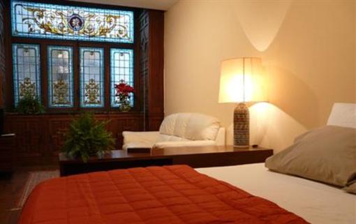 фото отеля Apartamentos Junto a la Giralda
