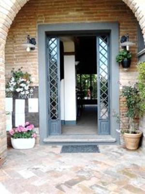 фото отеля Casale Etrusco Apartment Castagneto Carducci