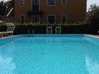 фото отеля Casale Etrusco Apartment Castagneto Carducci
