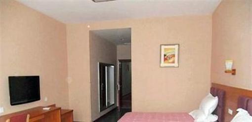 фото отеля Meiyijia Business Hotel Xinxiang Pingyuan Road