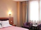 фото отеля Meiyijia Business Hotel Xinxiang Pingyuan Road