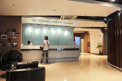 фото отеля Lemon Holiday Inn Qufu