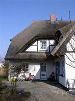 фото отеля Ferienhaus Rohrdachhus Middelhagen
