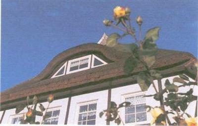 фото отеля Ferienhaus Rohrdachhus Middelhagen