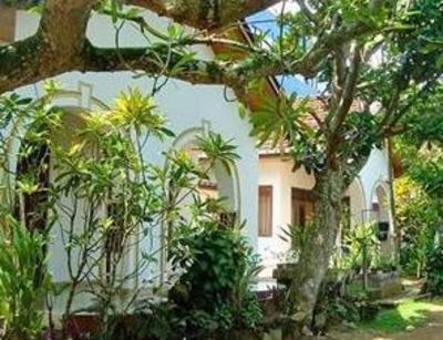 фото отеля Tandem Guesthouse Hikkaduwa