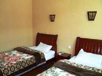 фото отеля Yijia Youth Inn Jiuzhaigou Branch 2