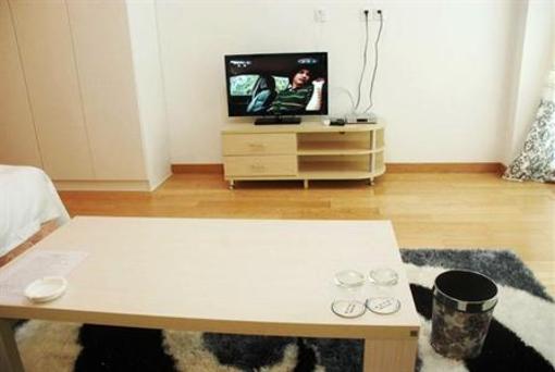 фото отеля Qingdao Poyatt Serviced Hotel and Residence