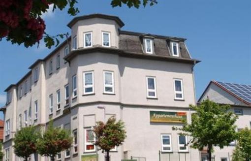 фото отеля Appartementhaus Am Schützenberg Gotha