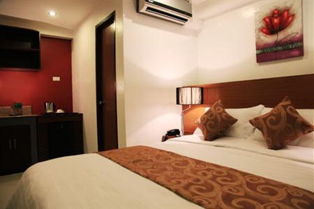 фото отеля Guijo Suites Makati