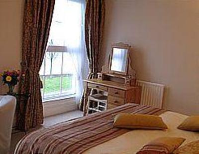 фото отеля Tides Reach Guest House