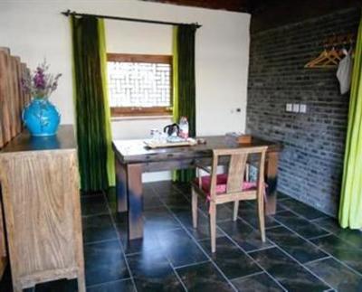 фото отеля Blossom Hill Inn Lijiang Lotusland
