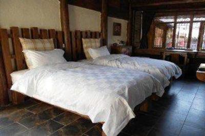 фото отеля Blossom Hill Inn Lijiang Lotusland