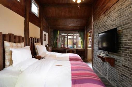 фото отеля Blossom Hill Inn Lijiang Lotusland