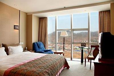 фото отеля BEST WESTERN Premier Qingdao Kilin Crown Hotel