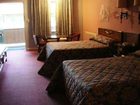 фото отеля Village Inn Motel Lovingston