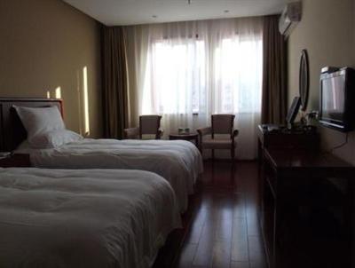 фото отеля Green Tree Inn Shaoxing Xinchang Dafou Express Hotel