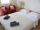 фото отеля Apartmani Levarda Hotel Okrug Gornji