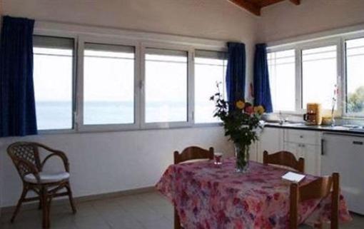 фото отеля Girogiali Apartments Nea Kydonia