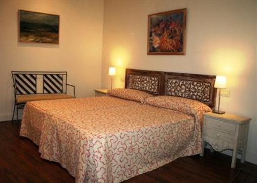 фото отеля Apartamentos Alvarez Quintero