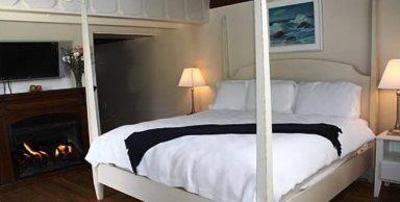 фото отеля Lamp Lighter Inn & Sunset House Suites