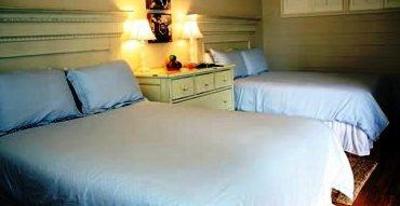 фото отеля Lamp Lighter Inn & Sunset House Suites