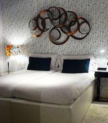фото отеля Apartamentos Manzana Madrid