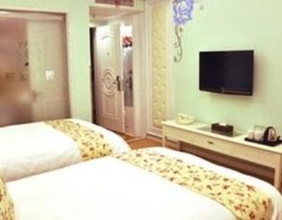 фото отеля Yiwu Venus Cidu Hotel