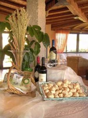 фото отеля Relais Fenicottero Rosa Hotel Loiri Porto San Paolo