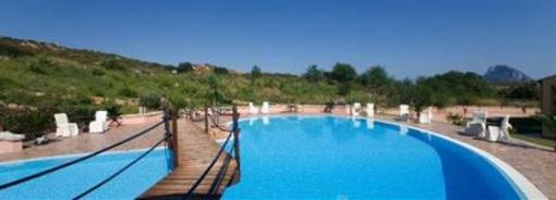 фото отеля Relais Fenicottero Rosa Hotel Loiri Porto San Paolo